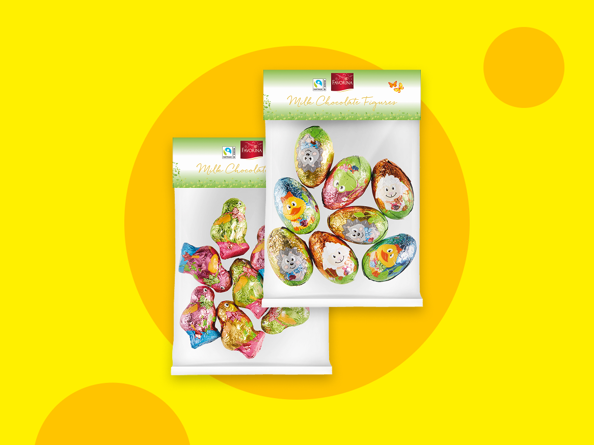 Duas embalagens de figuras de chocolate de leite, uma com ovos e outra com pássaros, sobre um fundo amarelo.